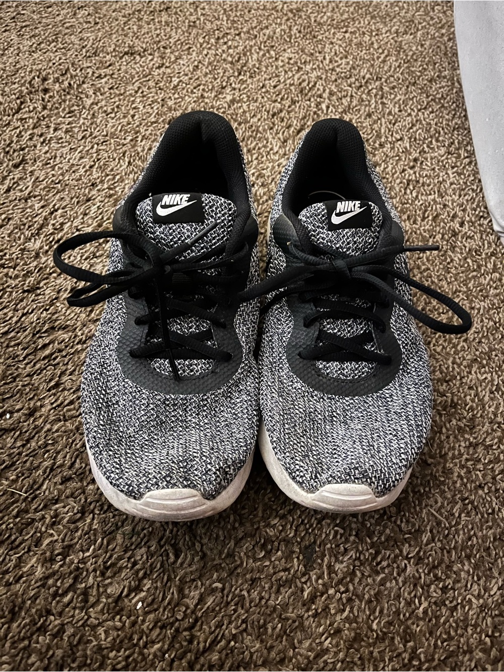 Nike Women’s Tanjin Black and Gray Knit Trainers